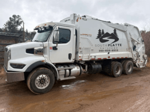 A South Platte Services residential trash service truck.