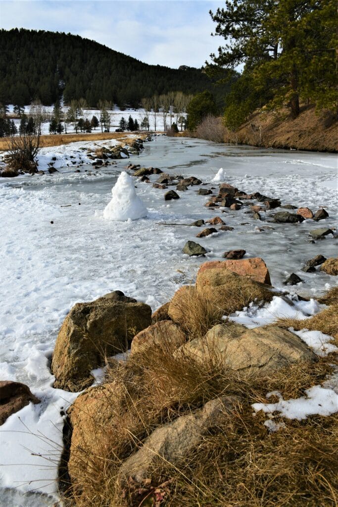 A frozen over river in the Evergreen Nature Center, Evergreen, CO.